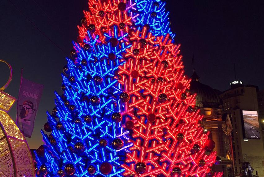 Blue and red digital Christmas tree lit up with LEDs 