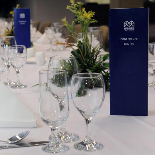 Melbourne Polytechnic's conference centre table set for an event.